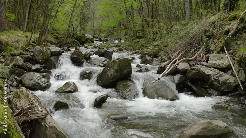 Aerial: Beautiful View Of River Flowing Amidst Green Trees, People Exploring During Vacation - Apennine Mountains, Italy Aerial: Beautiful View Of River Flowing Amidst Green Trees, People Exploring During Vacation - Apennine Mountains, Italy