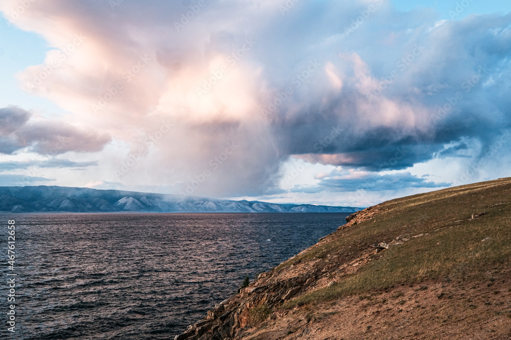 Fototapeta premium Beautiful red sunset on a hill in Khuzir, Olkhon Island, Baikal lake