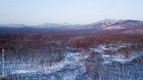 Sikhote-Alin Biosphere Reserve in winter. View from above. Picturesque nature and forest in the north of the Primorsky region.