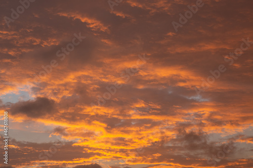 Background of clouds reddish by sunset light. © willbrasil21
