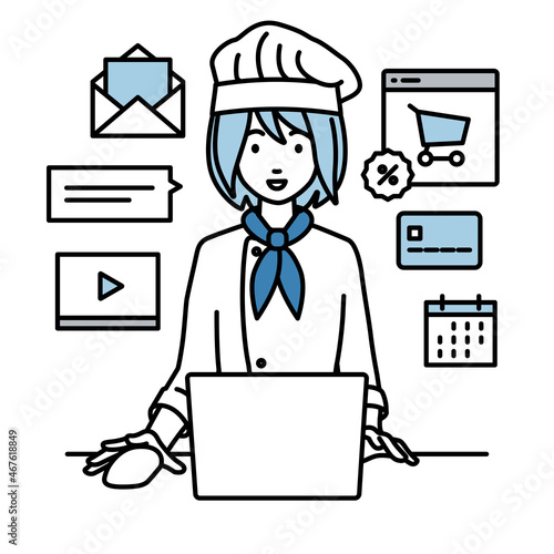 デスクで座ってPCでネットショップやマーケティングの仕事をしている調理師の女性