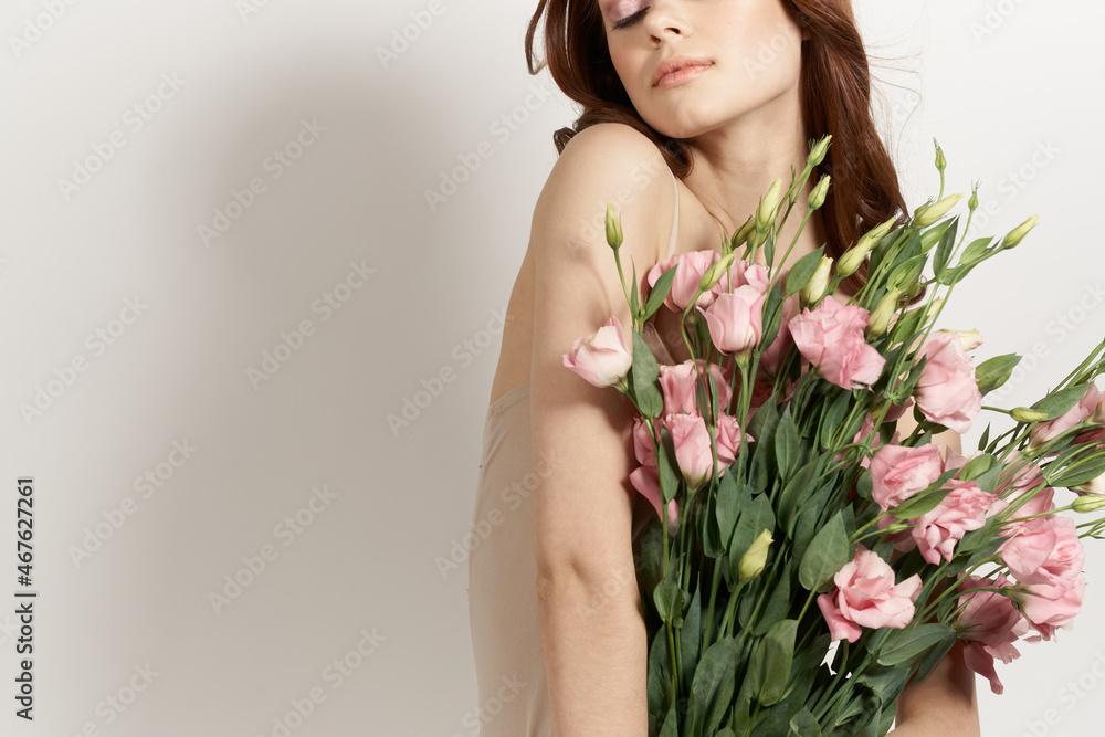 cheerful woman with a bouquet of flowers lifestyle glamor cheerful woman with a bouquet of flowers lifestyle glamor
