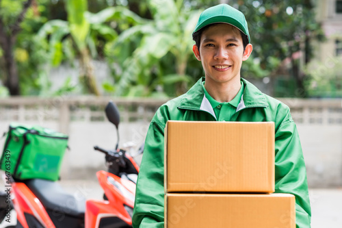 Smie courier deliveryman deliver parcel boxes
