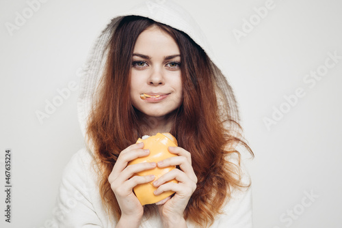 cheerful woman eating sandwich snack fast food