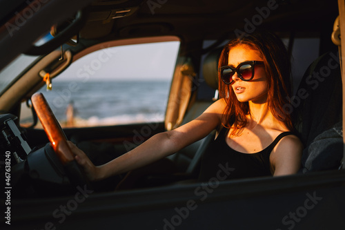 woman driving in car trip posing fashion travel © VICHIZH