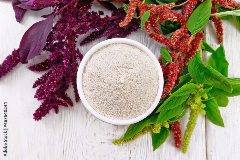 Flour amaranth in bowl on board top Flour amaranth in bowl on board top