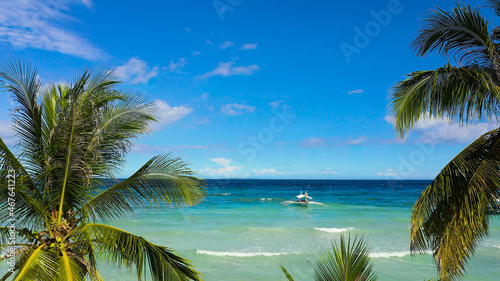 Fototapeta Naklejka Na Ścianę i Meble -  Beautiful tropical beach with white sand, palm trees, turquoise ocean. Panglao island, Bohol, Philippines.