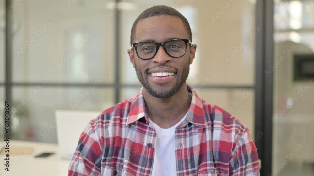 Portrait of African Man Waving, Welcoming Portrait of African Man Waving, Welcoming