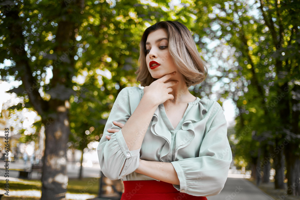 beautiful woman in a red skirt city walk fun leisure Fresh air beautiful woman in a red skirt city walk fun leisure Fresh air