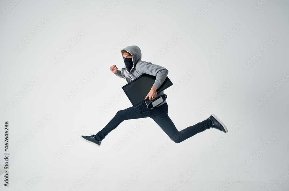 male thief crime anonymity caution balaclava isolated background