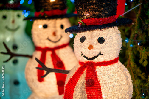 Snowman puppets at night in Dyker Heights, New York City - USA. photo