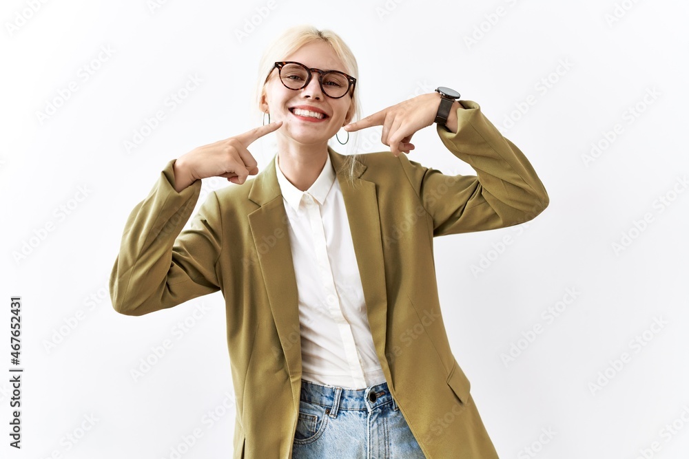 Beautiful caucasian business woman standing over isolated background smiling cheerful showing and pointing with fingers teeth and mouth. dental health concept. Beautiful caucasian business woman standing over isolated background smiling cheerful showing and pointing with fingers teeth and mouth. dental health concept.