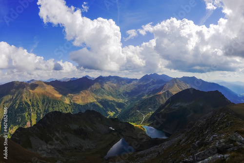 wide view to two lake and a colorful mountain range with beautiful sky panorama
