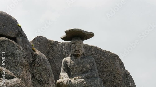 Medicine Buddha Statue on Gatbawi Rock at Seonbonsa Temple in Palgongsan Mountain