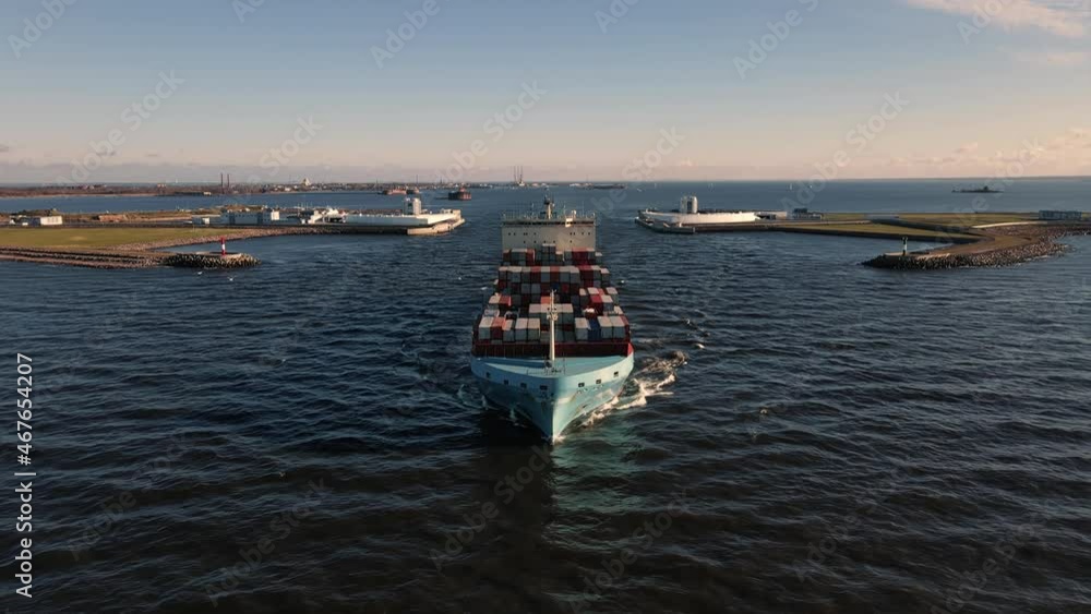 Aerial top view large cargo vessel ships under drone.Freight ship full of containers.Huge marine craft shipping import export cargo.Concept of sea transport logistics carriage.High quality 4k footage Aerial top view large cargo vessel ships under drone.Freight ship full of containers.Huge marine craft shipping import export cargo.Concept of sea transport logistics carriage.High quality 4k footage