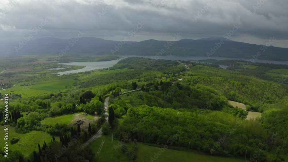 Aerial Lockdown Beautiful Shot Of Road On Green Hill, Drone Flying Over Landscape - Apennine Mountains, Italy Aerial Lockdown Beautiful Shot Of Road On Green Hill, Drone Flying Over Landscape - Apennine Mountains, Italy