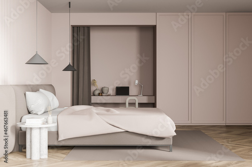 Beige bedroom with niche desk