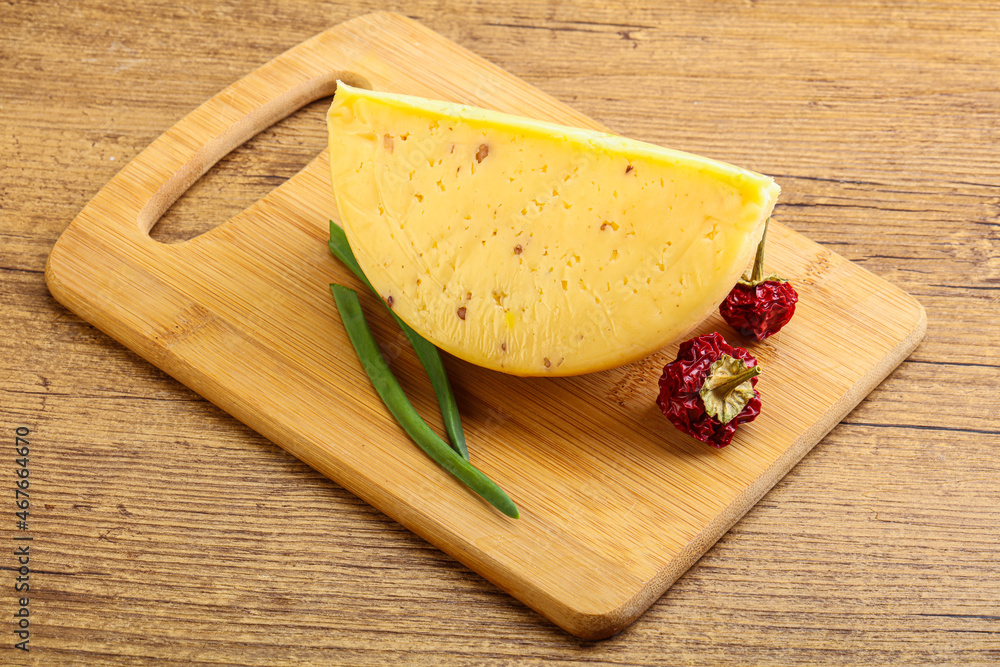 Hard cheese brick with walnut Hard cheese brick with walnut