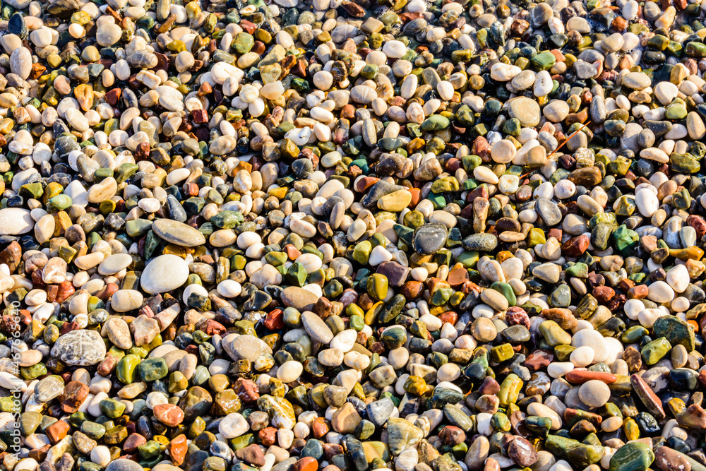 Texture of pebbles at the seaside. Natural background Texture of pebbles at the seaside. Natural background