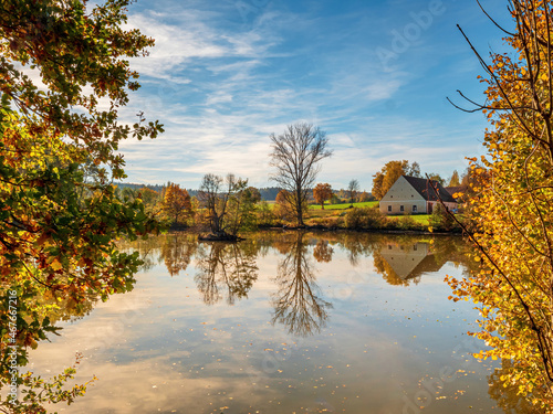 View to Bavarian lake with autumn colors at the foreground photo