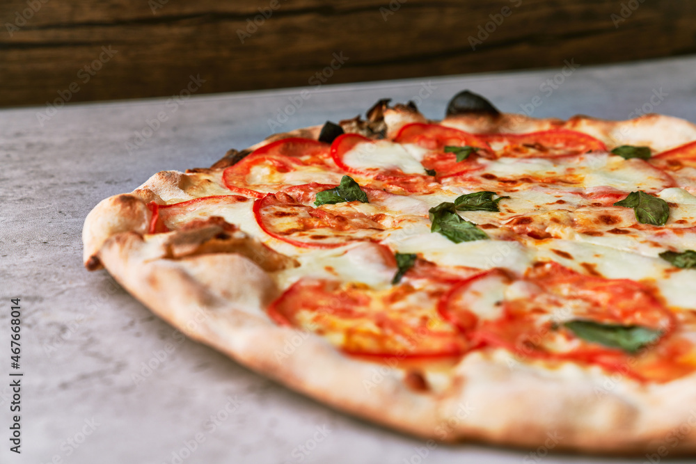  Delicious italian pizza on a concrete surface