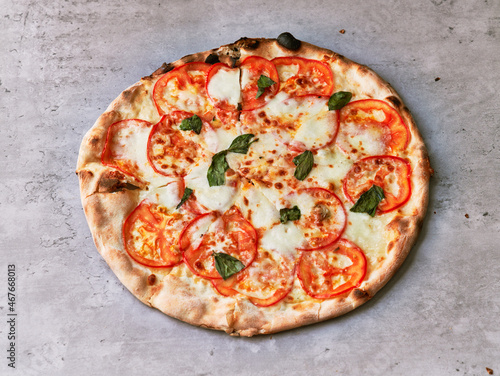  Delicious italian pizza on a concrete surface