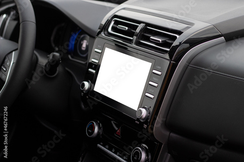 The interior of the car. Car-mounted tablet with mockup © yarm_sasha