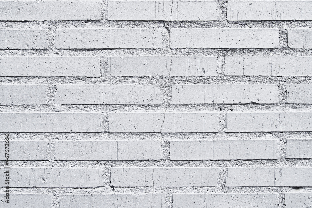 Brick wall texture with cracked tiles and cement. Classic brickwall surface background Brick wall texture with cracked tiles and cement. Classic brickwall surface background