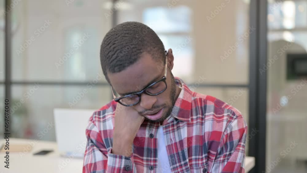 Portrait of Sleepy African Man taking Nap Portrait of Sleepy African Man taking Nap