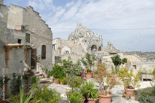 Typical stepped street between the historical buildings to Santa Maria di idris rupestrian church in Sasso Caveoso of Matera photo