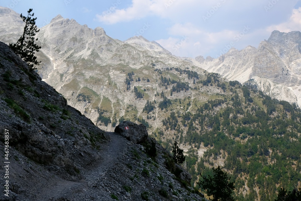 Fototapeta premium Beautiful mountain views on trail from Theth Valley to Valbona Valley in Albanian Alps. It is one of the most beautiful high mountain trails.
