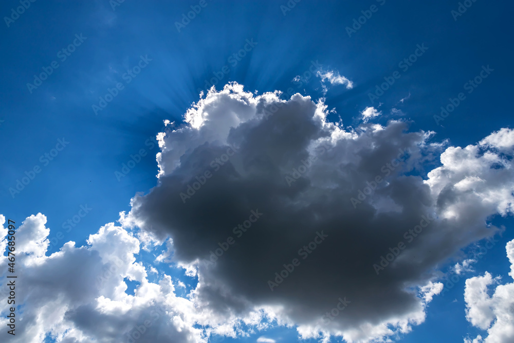 The rays of the sun shine out of the clouds. The rays of the sun shine out of the clouds.