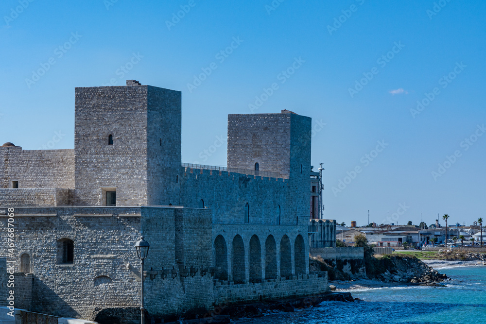 View of the Swabian castle of Trani. Stone fortress, on the sea. In Puglia, near Bari, Barletta, Andria