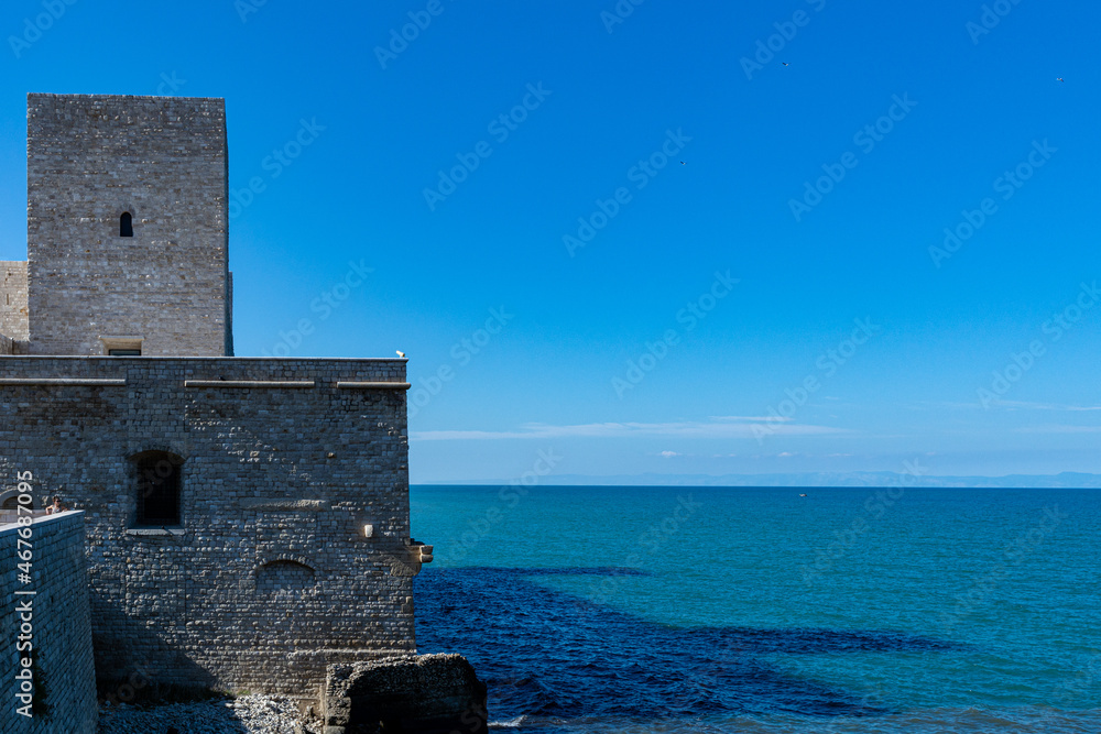 View of the Swabian castle of Trani. Stone fortress, on the sea. In Puglia, near Bari, Barletta, Andria