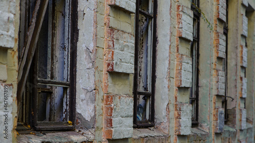 old abandoned premises, ruin. empty territories, abandoned houses. concept of war, Chernobyl disaster, apocalypse. brick buildings. sad view, heavy atmosphere, old broken windows © Oleksandr Filatov