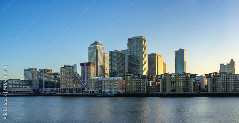 Panorama of Canary Wharf business district at dawn in London. England