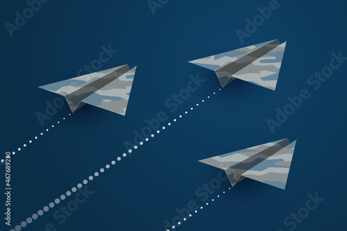 Airplanes made from paper with military camouflage pattern