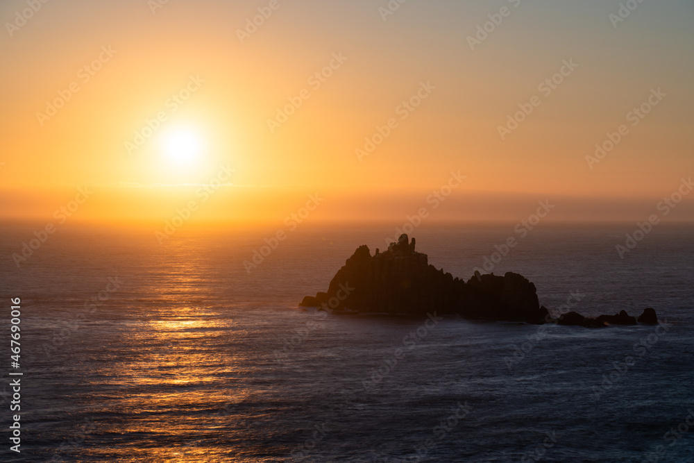 Lands End at sunset in Cornwall. United Kingdom