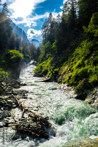 Wild River With Waterfall At Umbalfaelle On Mountain Grossvenediger In Nationalpark Hohe Tauern In Tirol In Austria