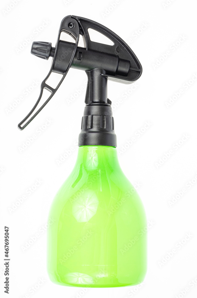 Green garden hand plant sprayer isolated on white background. Disease and pest control. Studio Photo Green garden hand plant sprayer isolated on white background. Disease and pest control. Studio Photo
