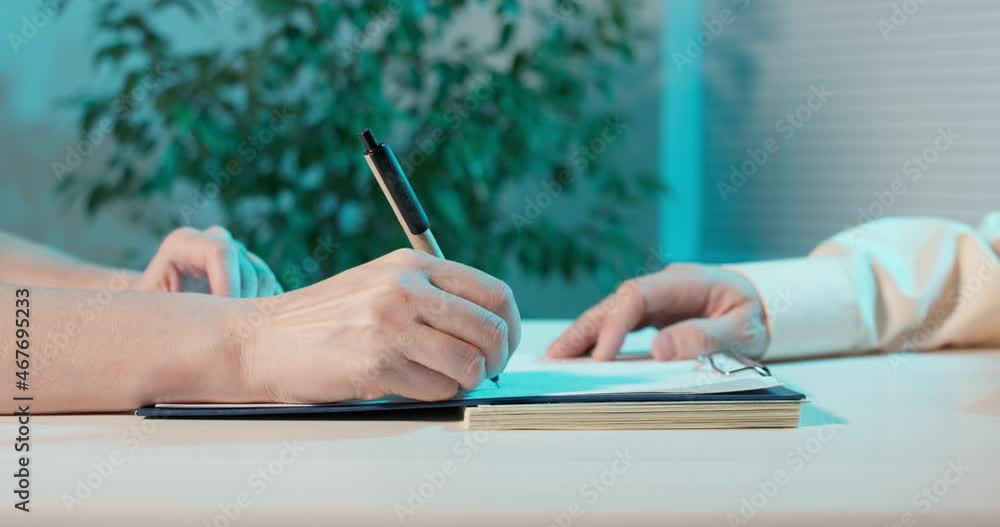 sign a contract for money. Close-up. receiving a bribe for signing a contract. sign a contract for money. Close-up. receiving a bribe for signing a contract.