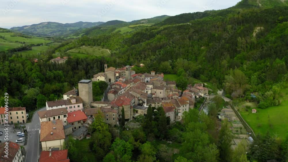Aerial Scenic View Of Residential Built Structures In Hills, Drone Flying Over Green Trees - Apennine Mountains, Italy Aerial Scenic View Of Residential Built Structures In Hills, Drone Flying Over Green Trees - Apennine Mountains, Italy