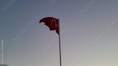 The Turkish flag is waving in the wind.