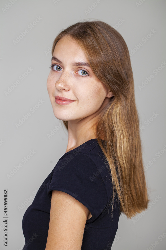 Fototapeta premium Close up portrait of a young beautiful woman