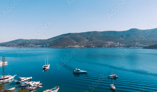 Natural background. A sea bay with yachts in the Aegean Sea, a view from a height.
