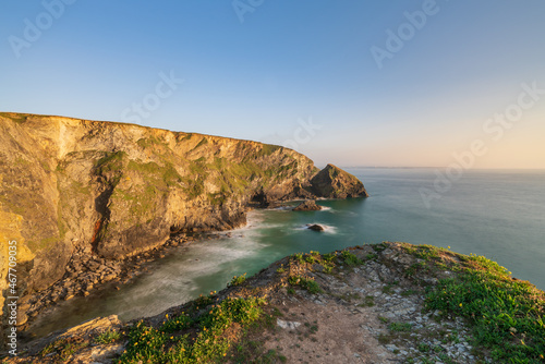 Golden hour view of the cliffs at Bedruthan Steps, North Cornwall, UK