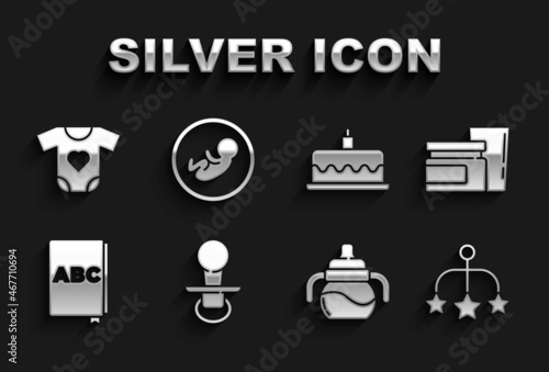 Set Baby dummy pacifier, food, crib hanging toys, bottle, ABC book, Cake with burning candles, clothes and icon. Vector