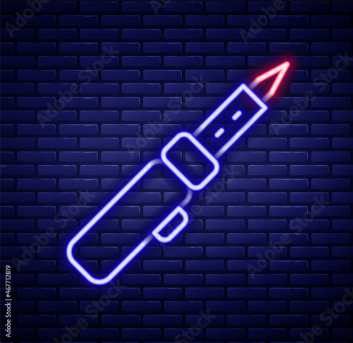 Glowing neon line Soldering iron icon isolated on brick wall background. Colorful outline concept. Vector