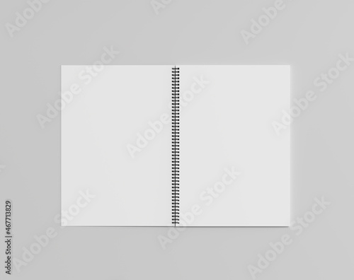 Blank open spring notebook on the empty background, notepad sheet photo