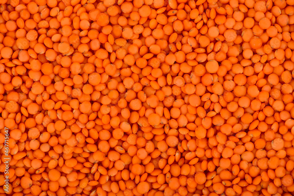 patern background of red lentil grains
